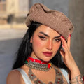Chapeau afghan en laine marron femme