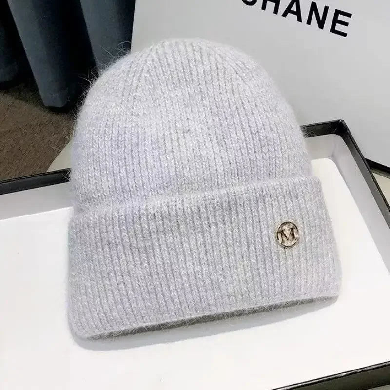 Chapeau et bonnet en laine beige