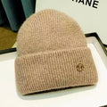 Chapeau et bonnet en laine beige